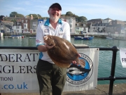 Richard-Russell-with-Line-record-Brill                        